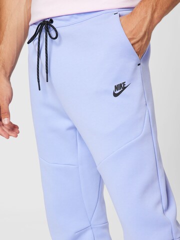 Nike Sportswear Tapered Παντελόνι σε λιλά