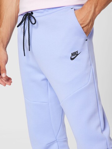 Nike Sportswear Дънки Tapered Leg Панталон в лилав