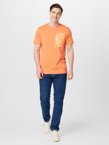 Maglietta di Calvin Klein Jeans in arancione