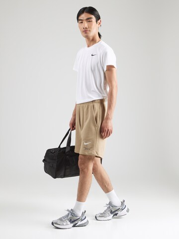 Nike Sportswear Обычный Штаны в Бежевый
