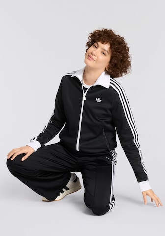 Pantaloni di ADIDAS ORIGINALS in nero