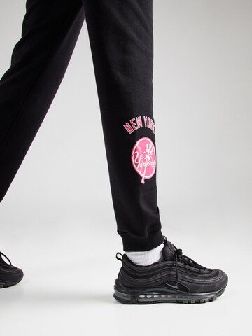 Champion Authentic Athletic Apparel Tapered Broek in Zwart