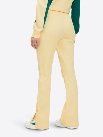 FILA Flared Pants 'LAIBEN' in Yellow