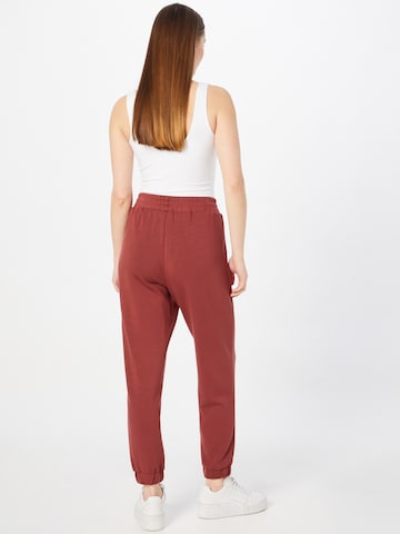 regular Pantaloni 'Sita' di ABOUT YOU in rosso