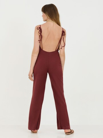 Tuta jumpsuit 'Leia' di ABOUT YOU x Sofia Tsakiridou in marrone