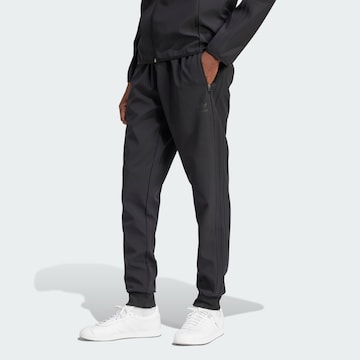 Tapered Pantaloni 'SST Bonded' de la ADIDAS ORIGINALS pe negru: față