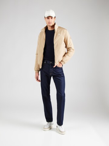 Calvin Klein Jeans regular Φθινοπωρινό και ανοιξιάτικο μπουφάν 'HARRINGTON' σε μπεζ