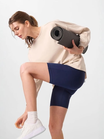 Tommy Life - Tapered Leggings 'Gamaschen' em azul: frente