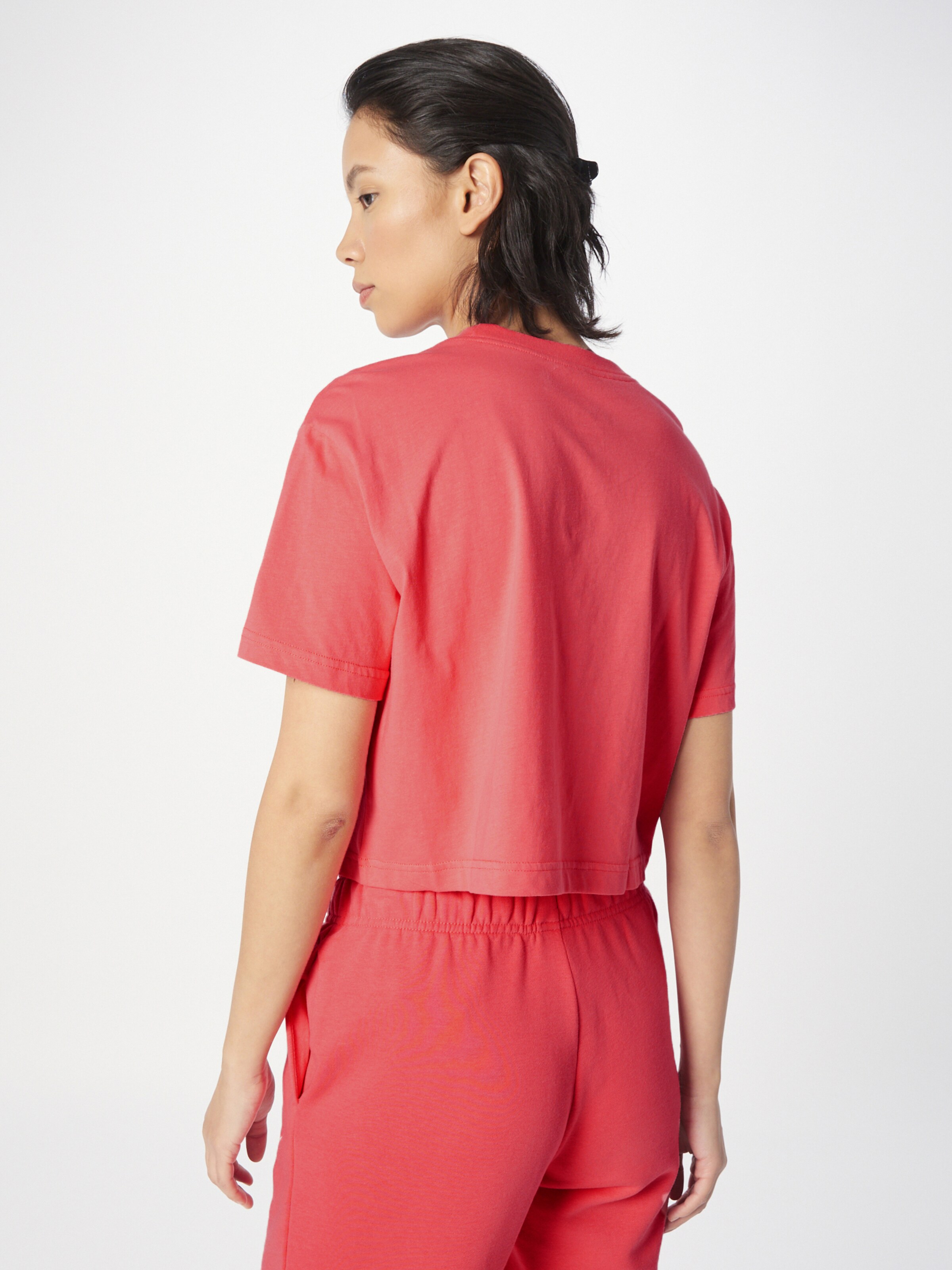 T shirt Nike Sportswear en Saumon ABOUT YOU