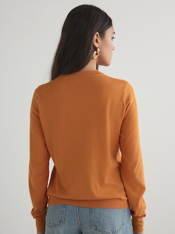 Next Gebreid vest in Oranje
