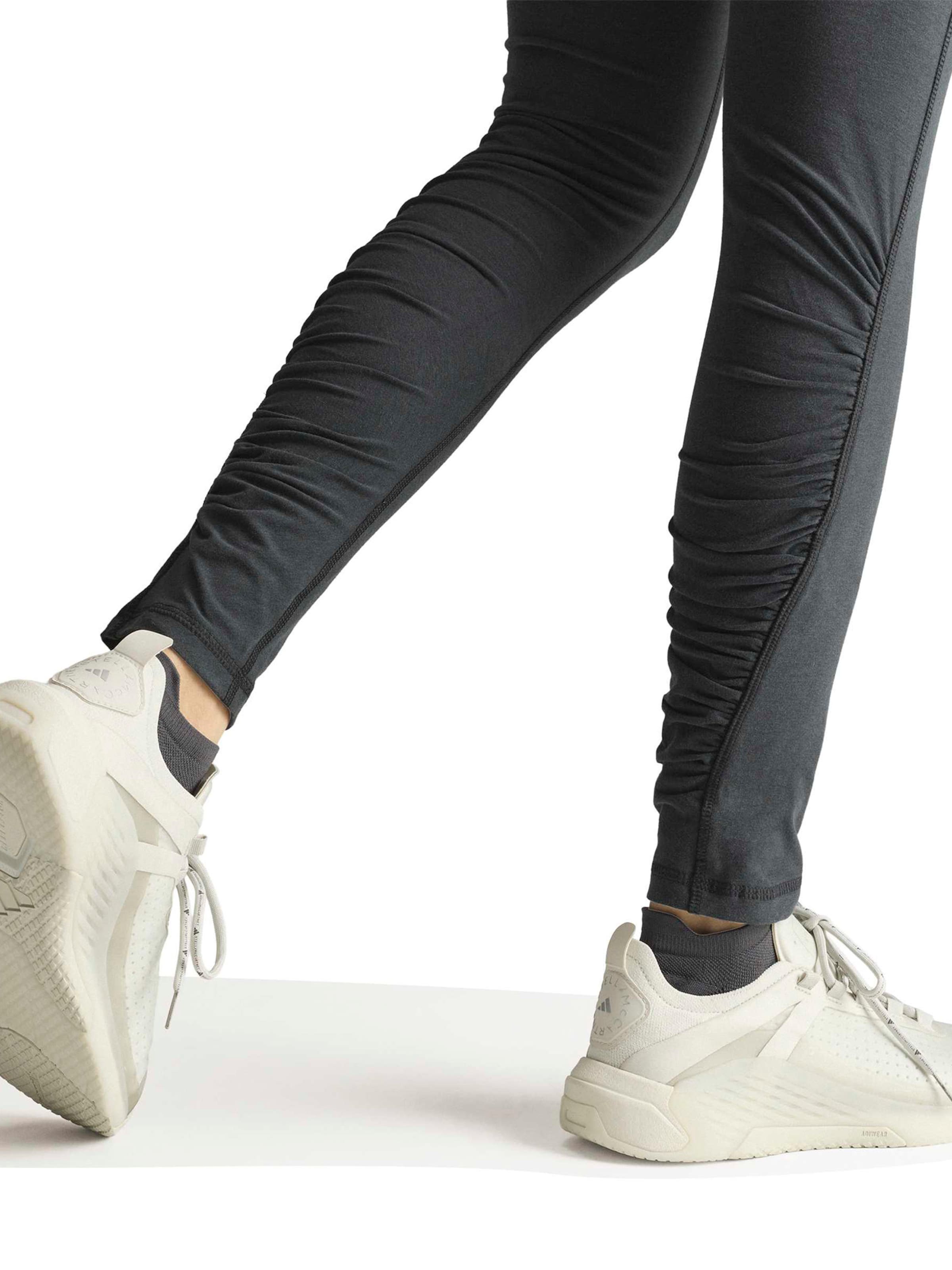 Skinny Pantaloni sportivi di ADIDAS BY STELLA MCCARTNEY in nero