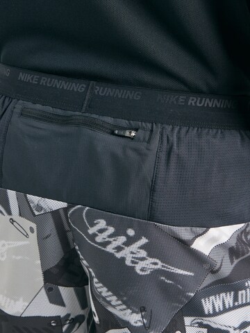 NIKE Regular Sports trousers 'ENRGY' in Black