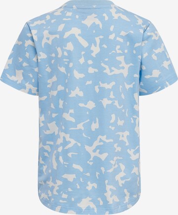 T-Shirt 'CARITAS' Hummel en bleu