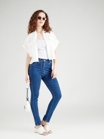 Coupe slim Jean Wallis en bleu