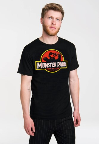 LOGOSHIRT T-Shirt 'Cookie Monster - Monster Park' in Schwarz: predná strana