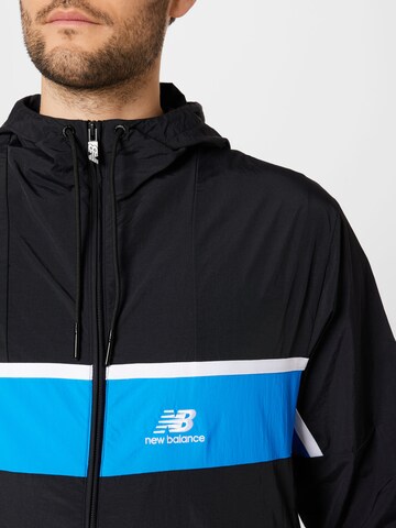 new balance Trainingsjacke in Schwarz