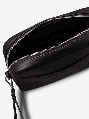 Sac à bandoulière Calvin Klein Jeans en noir