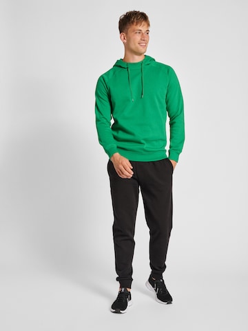 Sweat-shirt Hummel en vert