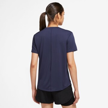 NIKE Performance shirt 'Swoosh' in Blue