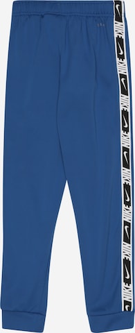 Nike Sportswear Дънки Tapered Leg Панталон в синьо