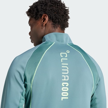 ADIDAS PERFORMANCE - Camiseta funcional en azul