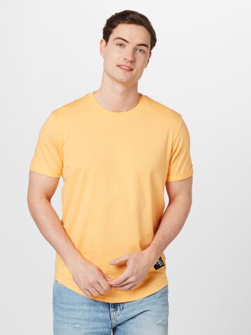 Calvin Klein Jeans - Camiseta en naranja: frente