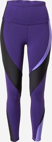 Reebok - Skinny Calças de desporto em roxo: frente