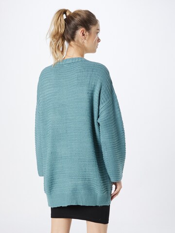 ABOUT YOU Knit cardigan 'Theodora' in Green