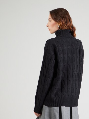 TOMMY HILFIGER Trui in Zwart