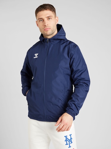 Hummel Sportjas 'ESSENTIAL' in Blauw: voorkant