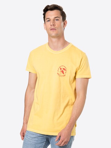 Revolution T-Shirt in Gelb: Vorderseite