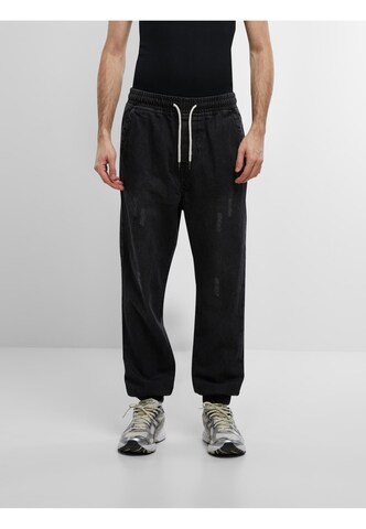 Urban Classics Tapered Jeans in Schwarz: Vorderseite