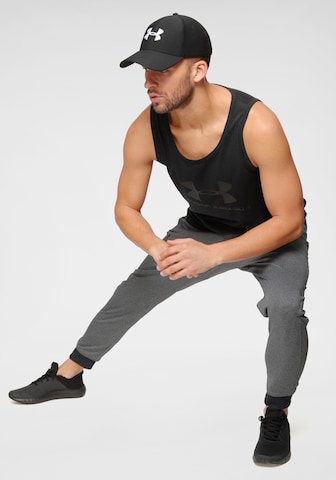 UNDER ARMOUR Tapered Sportbroek in Grijs