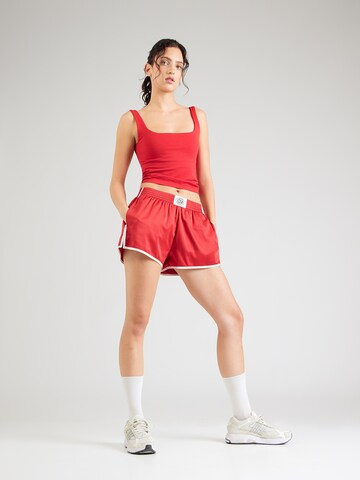 regular Pantaloni sportivi di ICANIWILL in rosso