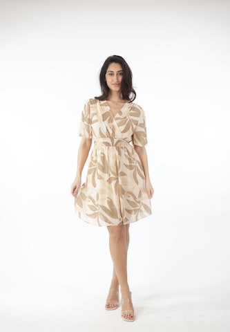 Elara Kjole i beige: forside