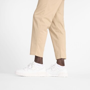 Regular Pantalon 'Athletics Pant 28' new balance en beige
