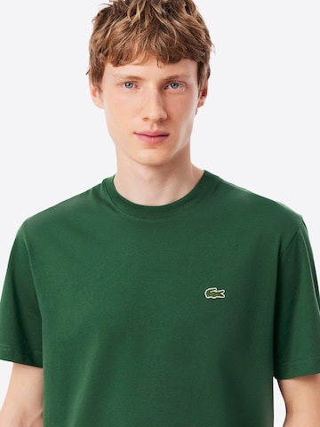 Maglietta 'T-shirt LACOSTE da Uomo - bianco TH7318001 BIANCO' di LACOSTE in verde