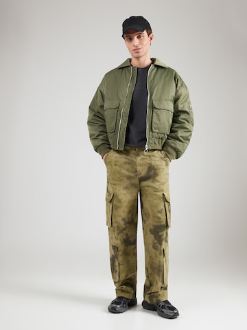 T-Shirt 'WE FLOAT' Nike Sportswear en gris