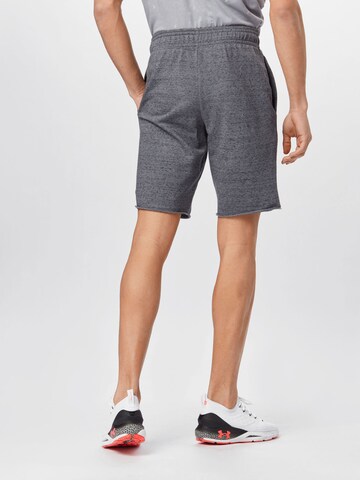 Regular Pantalon de sport 'Rival Terry' UNDER ARMOUR en gris