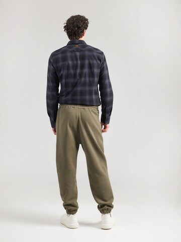 HOLLISTER Baggy Hose in Grün