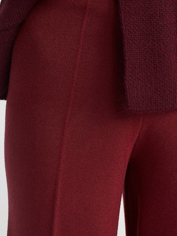 Dilvin - Perna larga Calças 'Hose' em vermelho