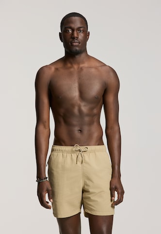 Pantaloncini da bagno di Shiwi in beige: frontale