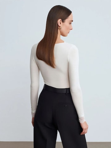 Dilvin - Blusa em branco