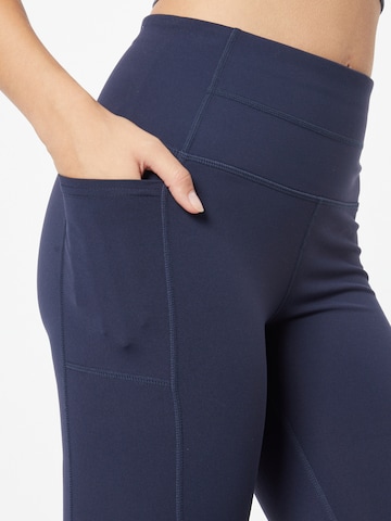 SKECHERS Skinny Workout Pants in Blue