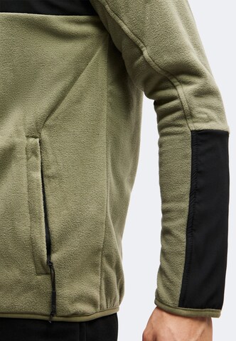 4F - Chaqueta polar funcional en verde
