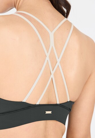Athlecia Low Support Sport-BH 'Aspasia' in Weiß