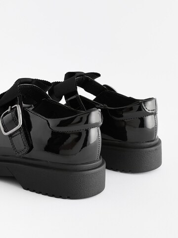 Next - Bailarina en negro
