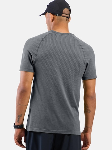 ODLO Funktionsshirt 'ESSENTIAL SEAMLESS'‌‌‌‌‌‌‌‌ in Grau