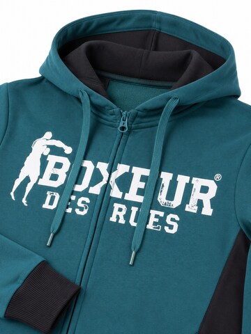 Boxeur des Rues - Sudadera 'Herren Hoodie Fitted Boxeur des Rues mit Reißverschluss und Kapuze, Petrolblau, Weißes Logo, Baumwolle' en azul