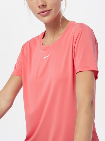 T-shirt fonctionnel NIKE en orange